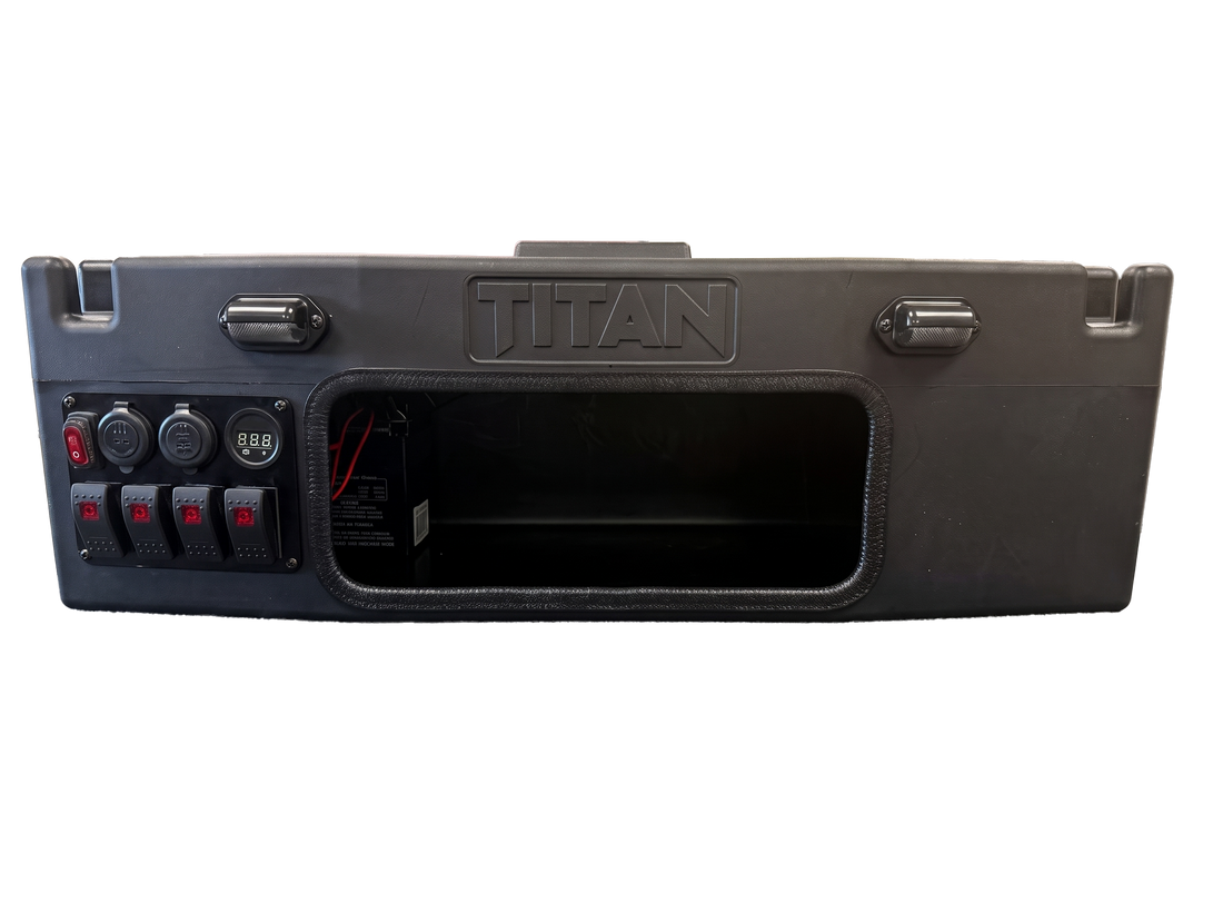 A rugged black tactical hard case with a built-in control panel featuring rocker switches, power outlets, and a large front cutout, shown on a plain white background.