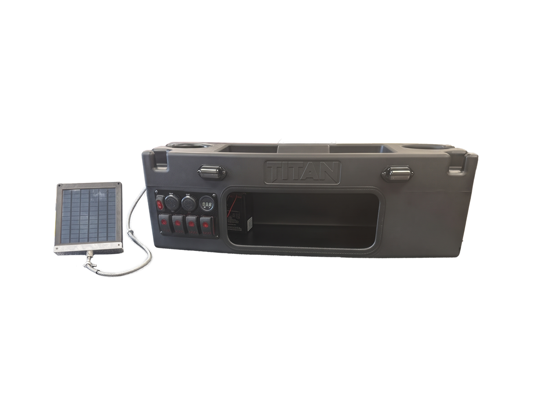 A rugged black tactical hard case with a built-in control panel featuring rocker switches, power outlets, and a large front cutout, shown on a plain white background.
