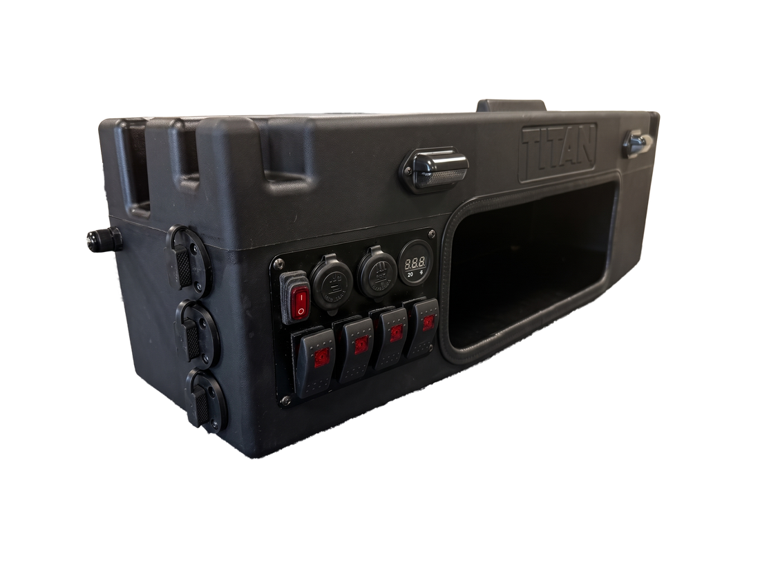 A rugged black tactical hard case with a built-in control panel featuring rocker switches, power outlets, and a large front cutout, shown on a plain white background.