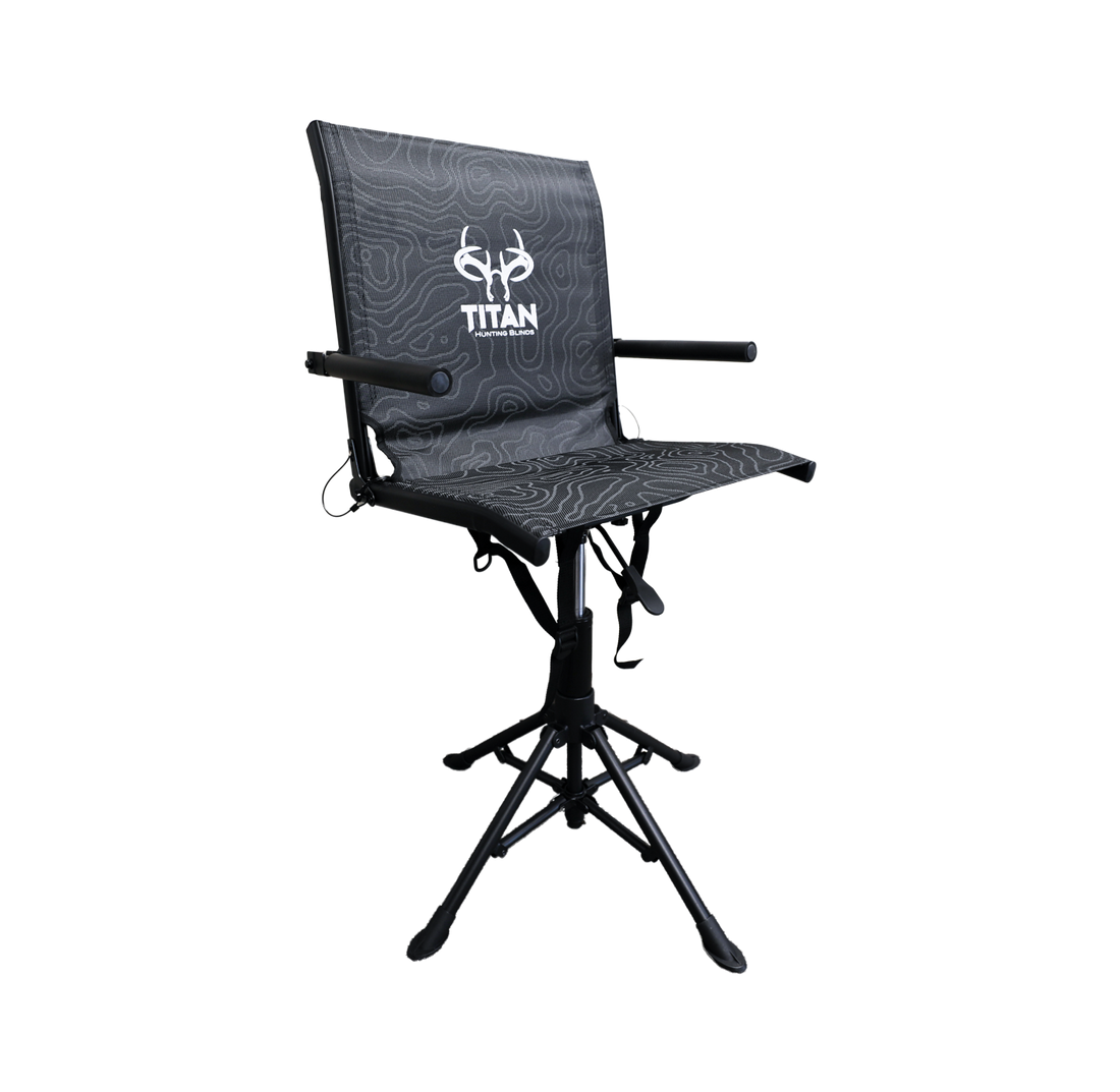A black hunting chair with topographic white on pattern over the mesh on the chair, with small armrests and a swivel base holding the chair up.
