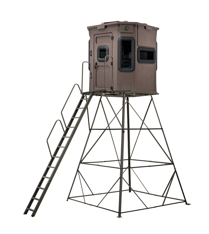 Titan Pro Archery & Rifle Combo Blind in tree-trunk brown, mounted on a 12ft tower with ladder