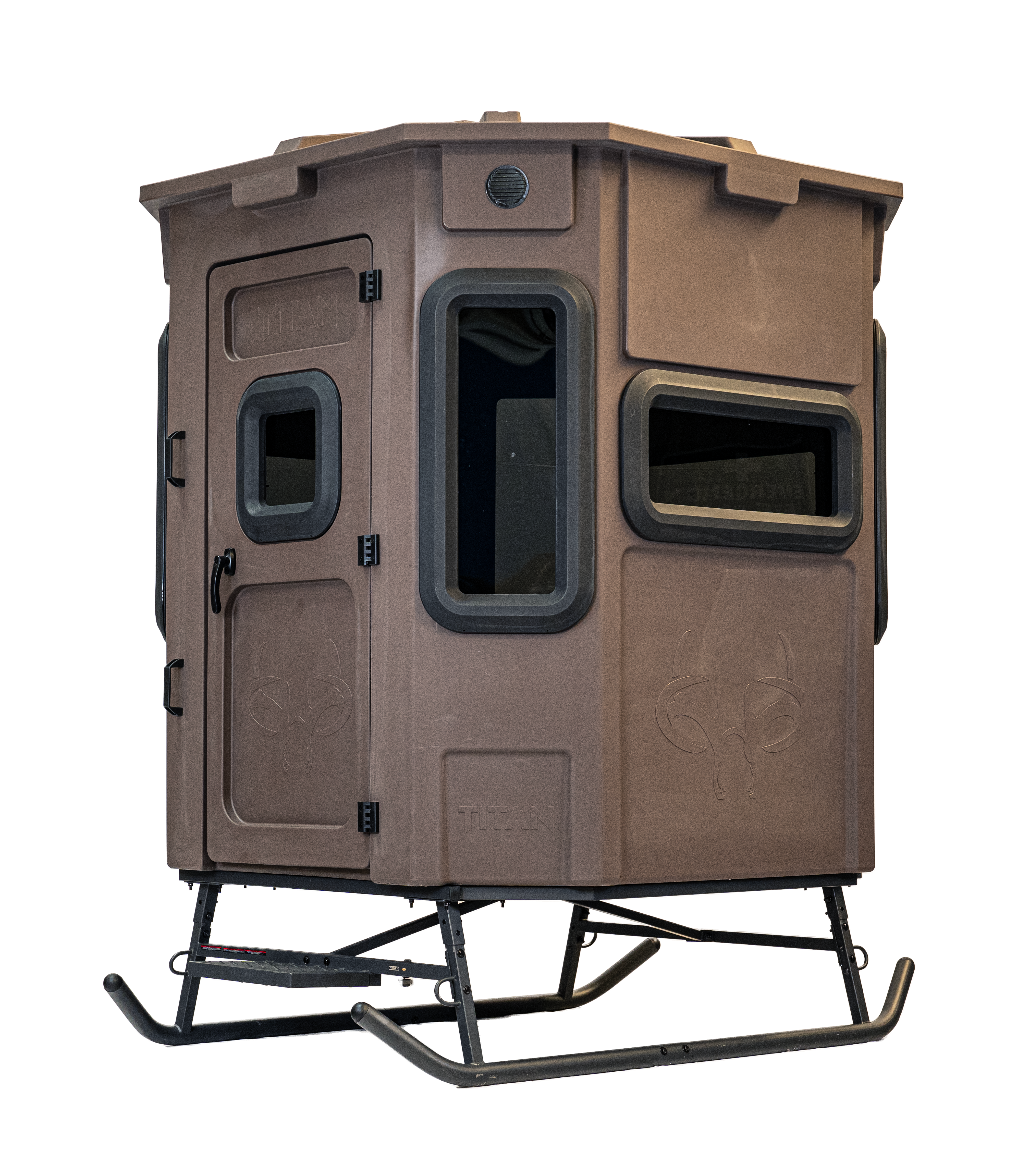 Titan Pro Archery & Rifle Combo Blind in tree-trunk brown, set up on a metal skid base