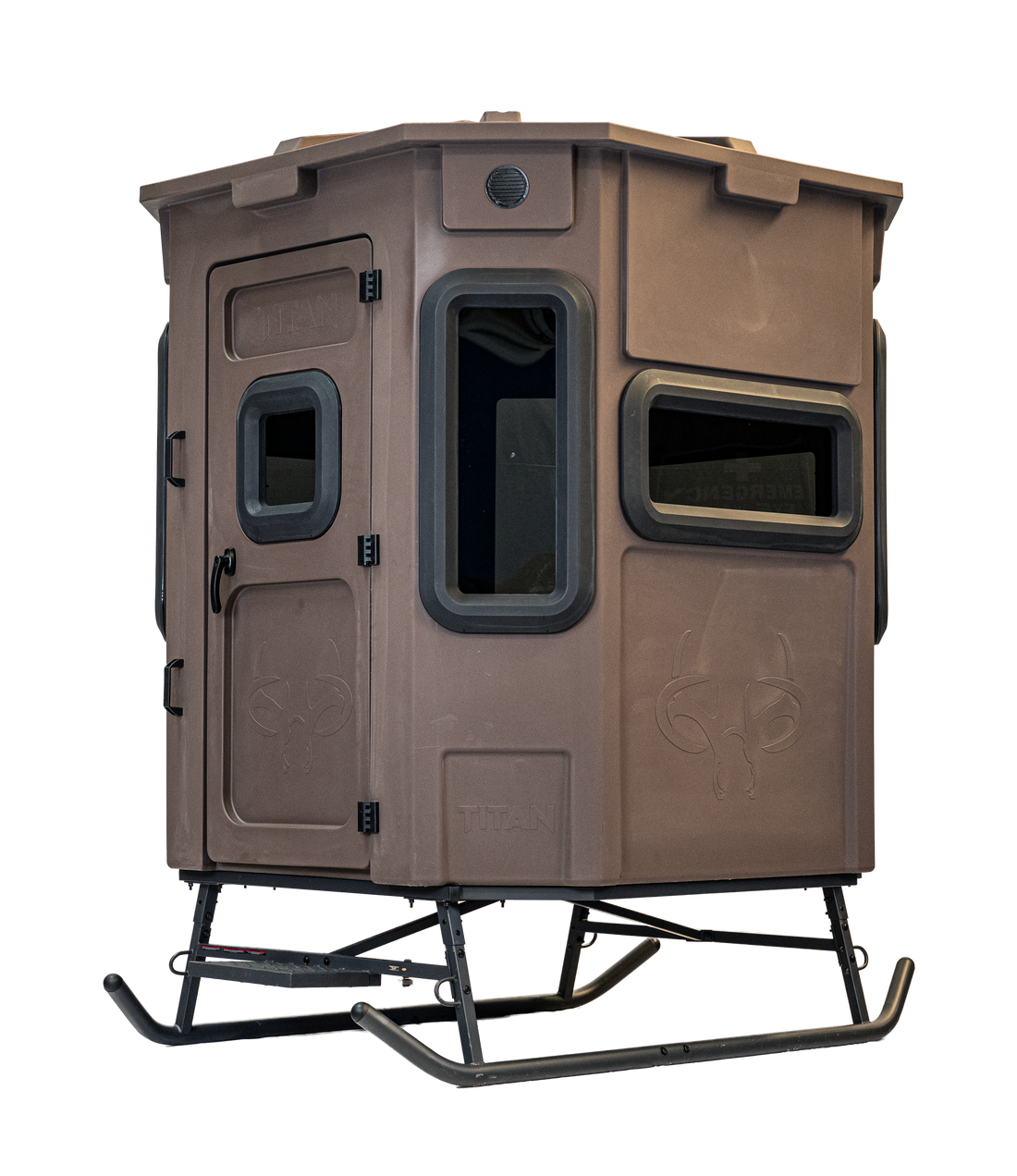 Titan Pro Archery & Rifle Combo Blind in tree-trunk brown, set up on a metal skid base