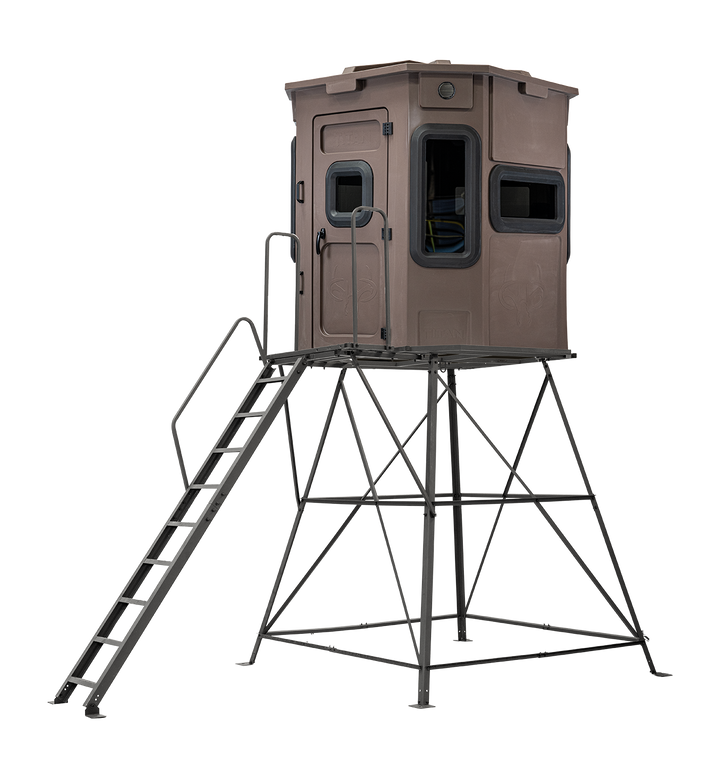 Titan Pro Archery & Rifle Combo Blind in tree-trunk brown, mounted on a 8ft tower with ladder