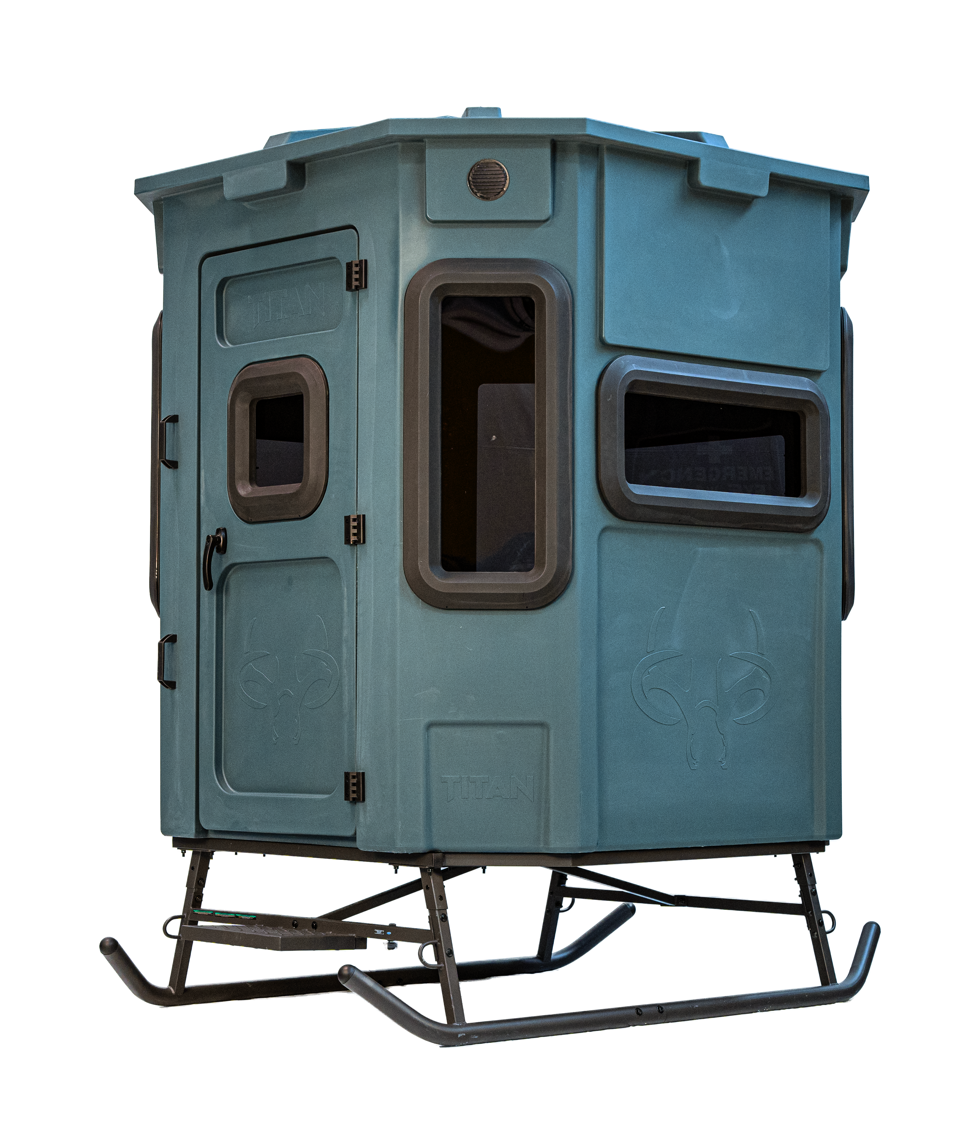 Titan Pro Archery & Rifle Combo Blind in forest green, set up on a metal skid base