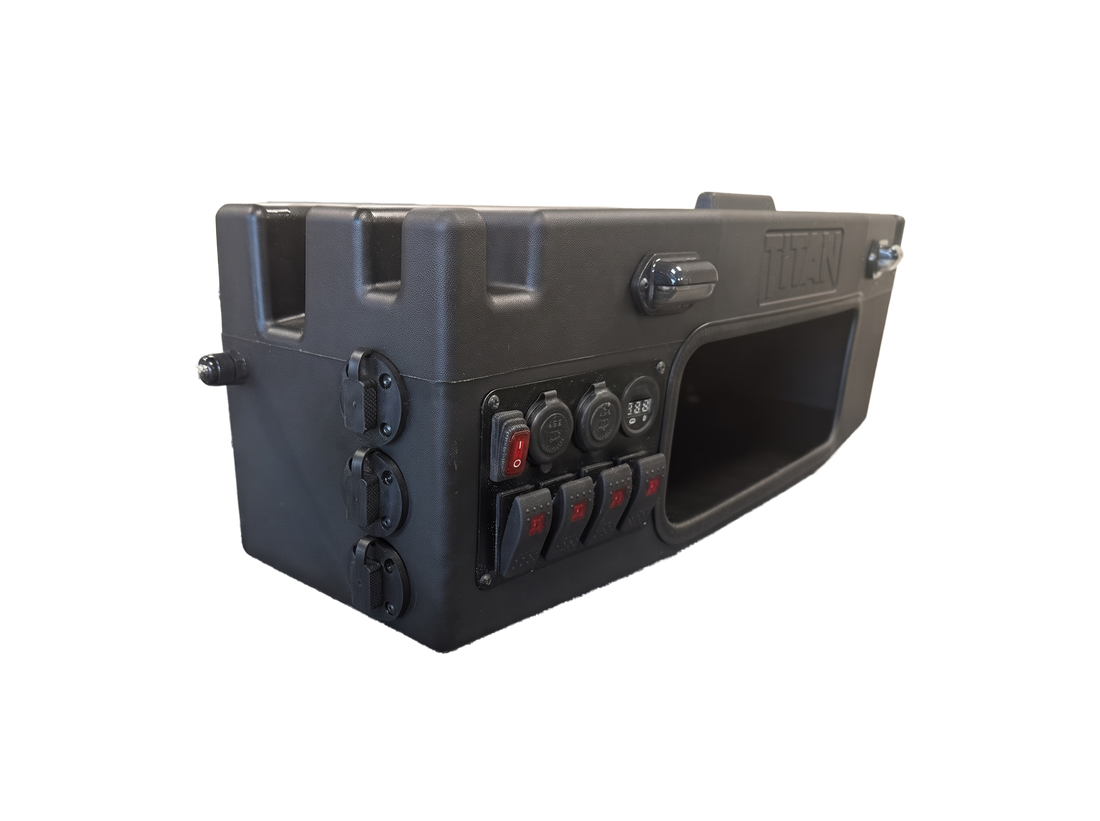 A rugged black plastic electrical box with multiple switches, outlets, and a power connection port, shown on a plain white background.